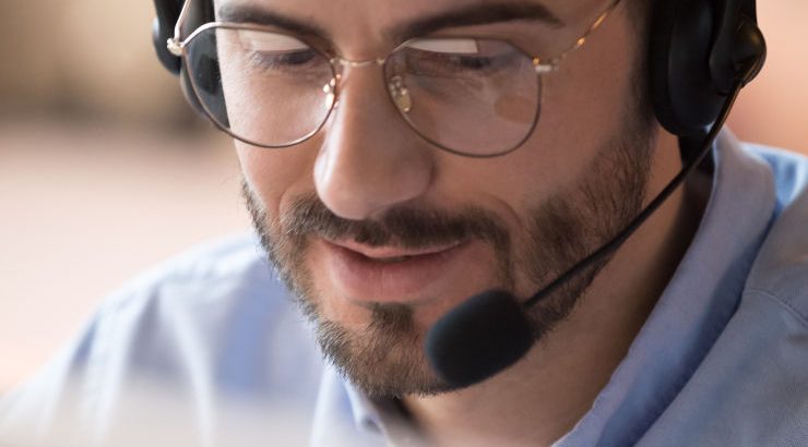 Team member on headset answering nbn calls for the Canberra region